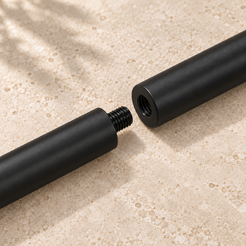 Close-up of the threaded connector and matching socket joining two SÖM Mobility Stick sections.